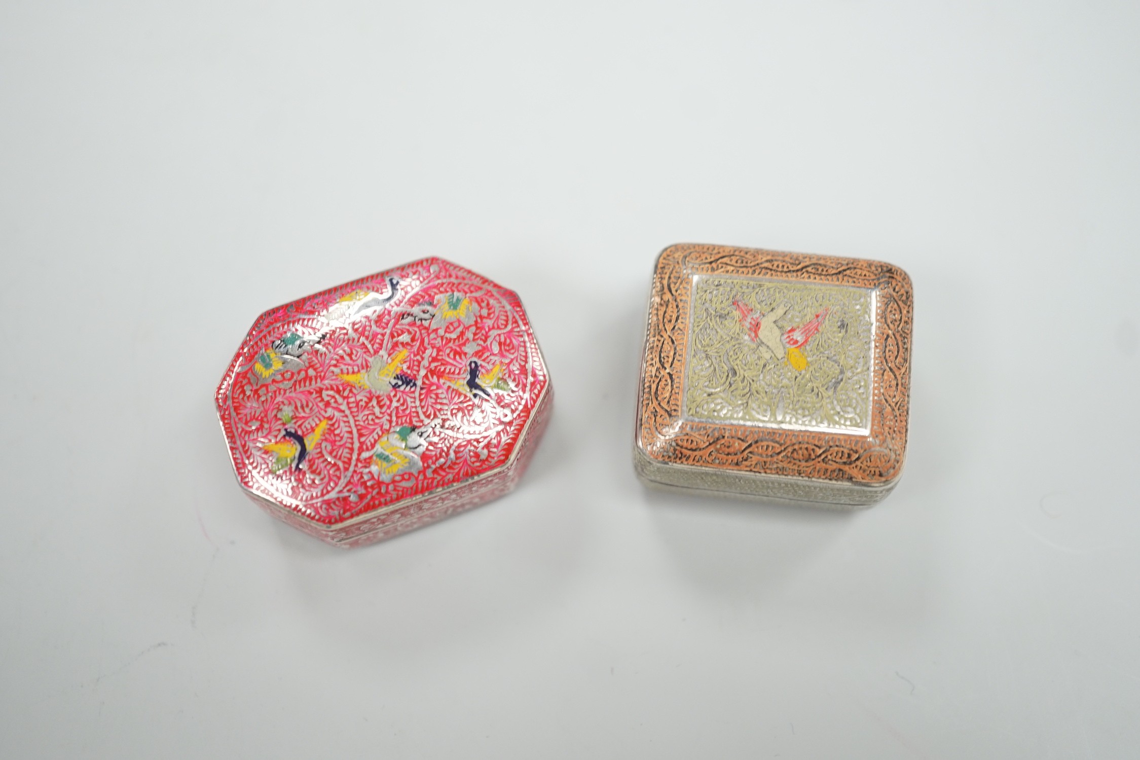 Two early 20th century? Persian white metal and enamelled pill boxes, including octagonal, 35mm.